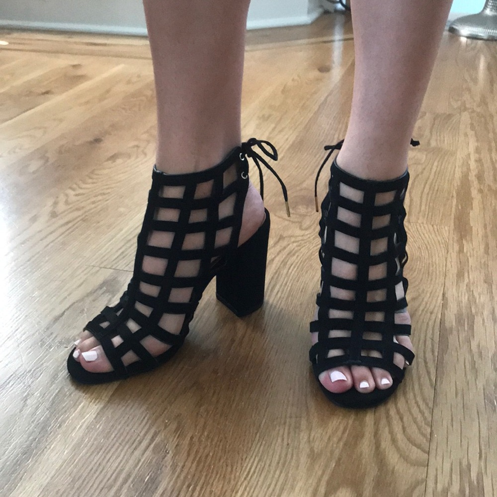 Caged black heels